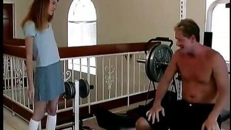 Skinny Barely Legal Slut Sucks a Hard Cock on a Weight Bench Then Gets Drilled